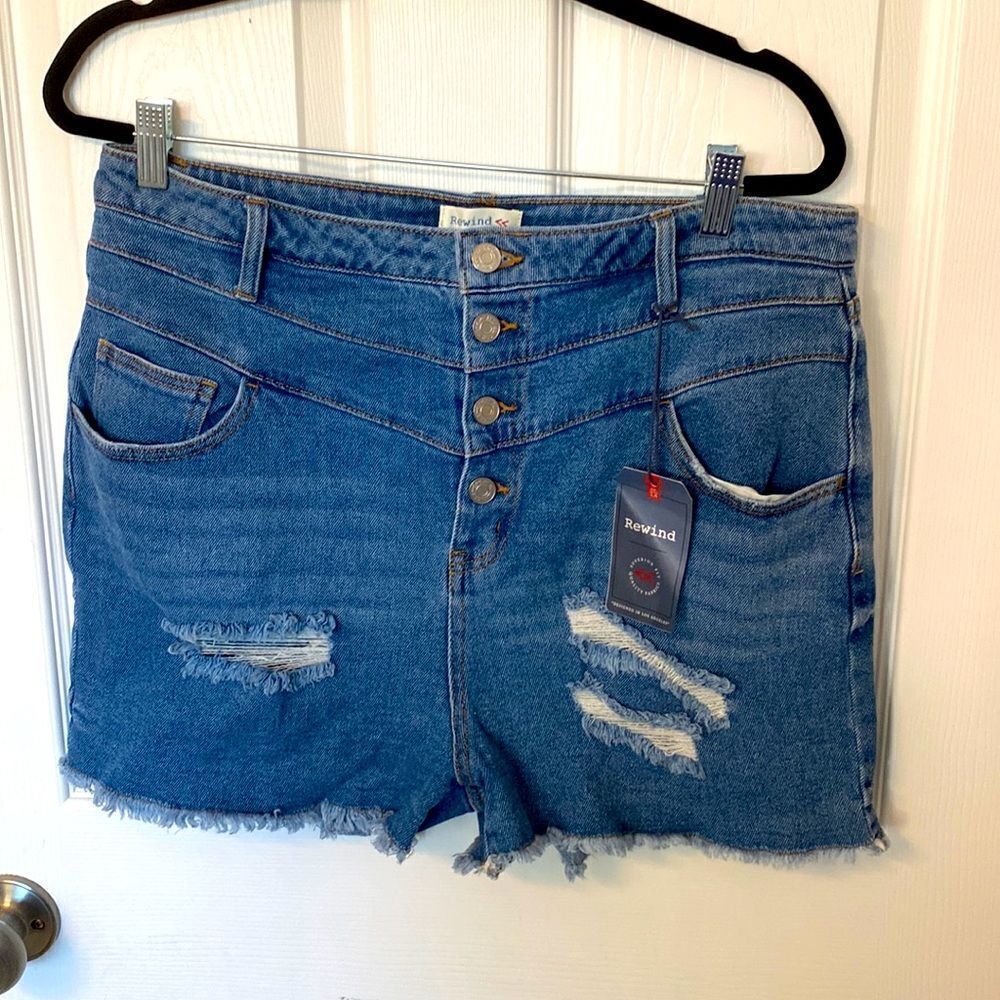 NWT- rewind high rise, medium wash- distressed Jean shorts- size 15/32W